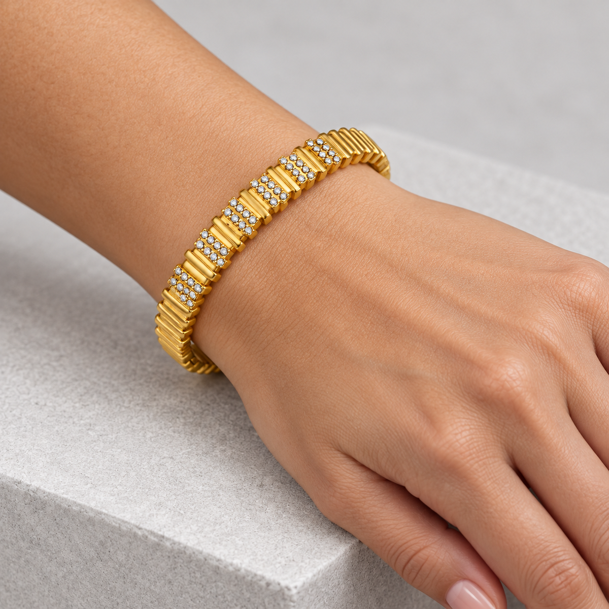 Aurea Ribbed Pavé Bangle worn by a studio model