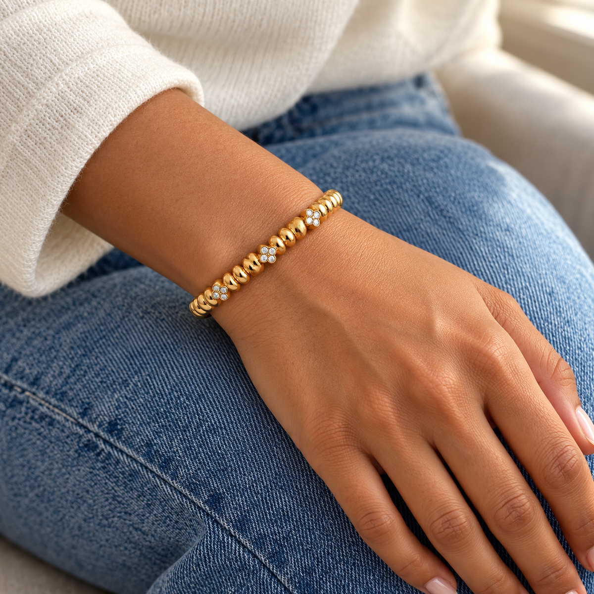 AI-generated lifestyle illustration of Solara Beaded Sparkle Bangle – Gold-Tone Moissanite worn in an everyday setting.