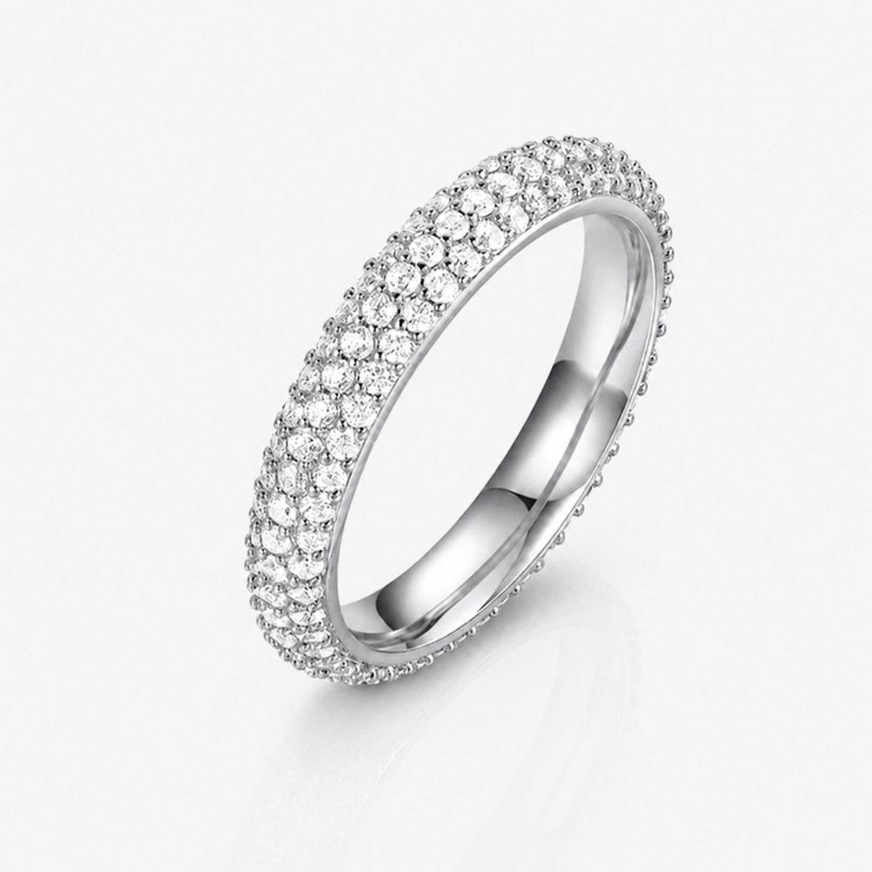 Pavé diamond band ring in white gold, domed design