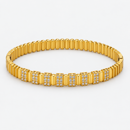 Aurea Ribbed Pavé Bangle centered on a light gray background