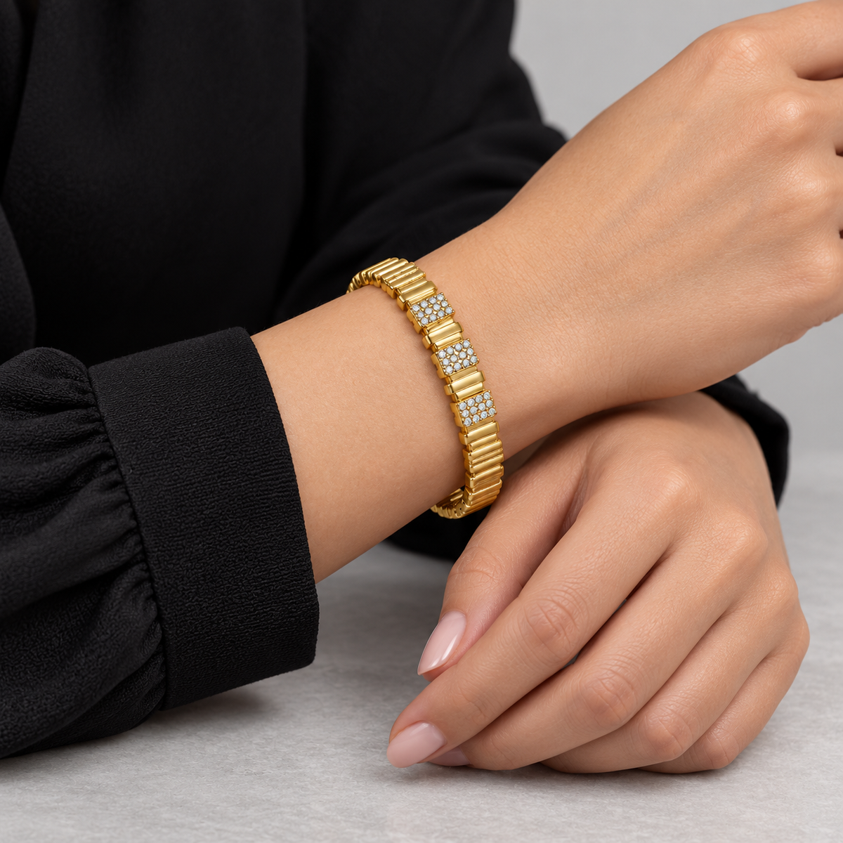 Aurea Ribbed Pavé Bangle worn by a studio model