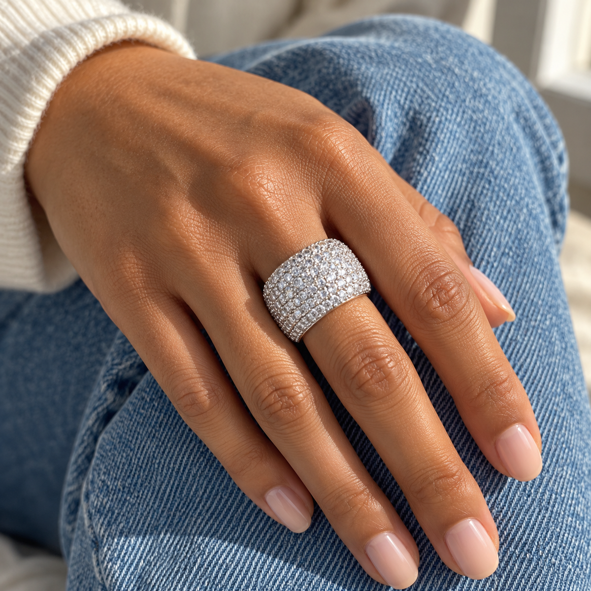 AI-generated lifestyle illustration of Aurelia Pavé Dome Ring – Moissanite Statement Band worn in an everyday setting.