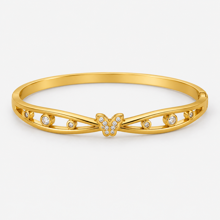 Celeste Butterfly Openwork Bangle centered on a light gray background
