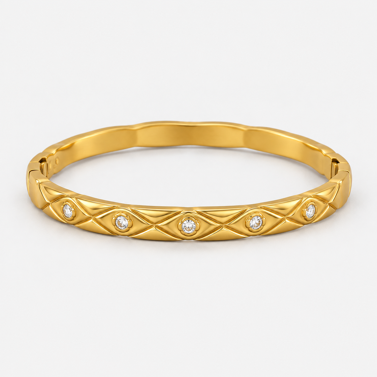 Elara Quilted Sparkle Bangle centered on a light gray background