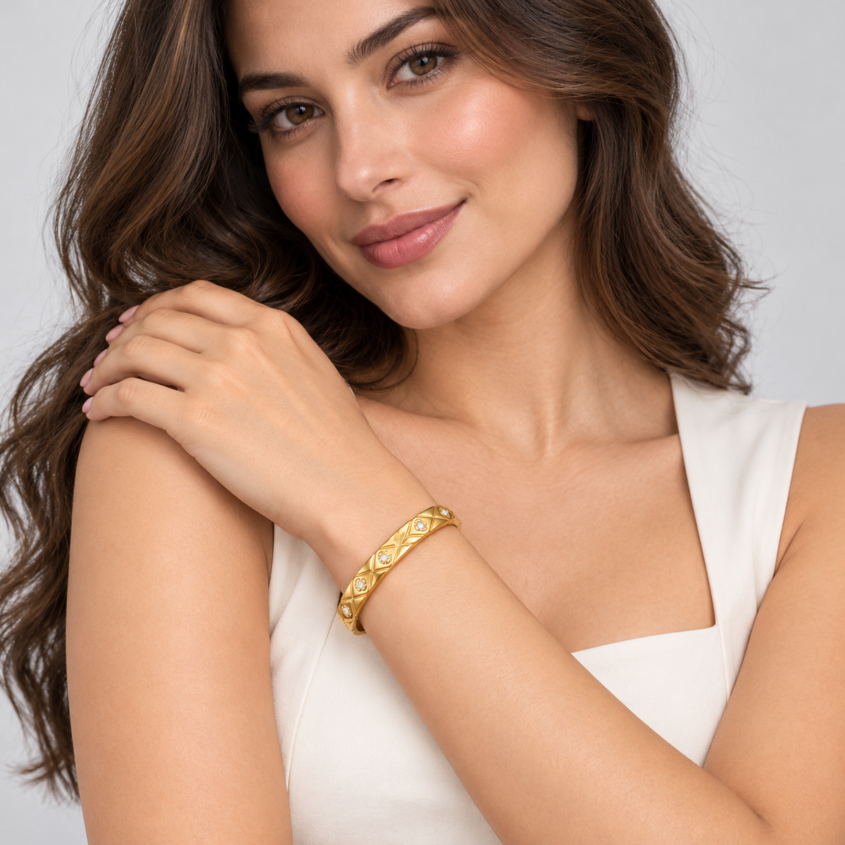 Elara Quilted Sparkle Bangle worn by a studio model