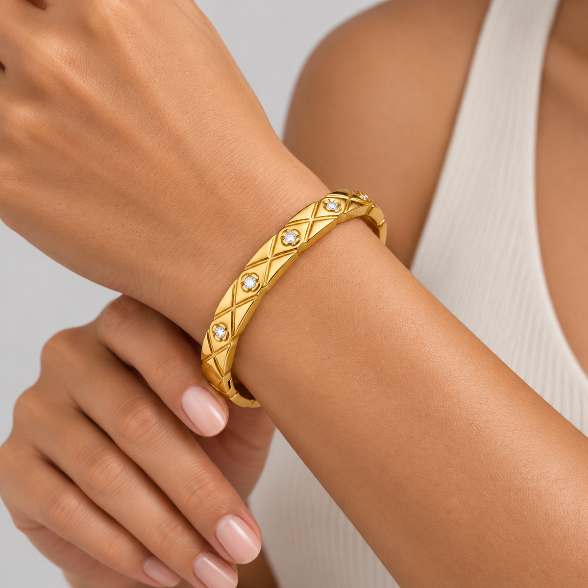 Elara Quilted Sparkle Bangle worn by a studio model