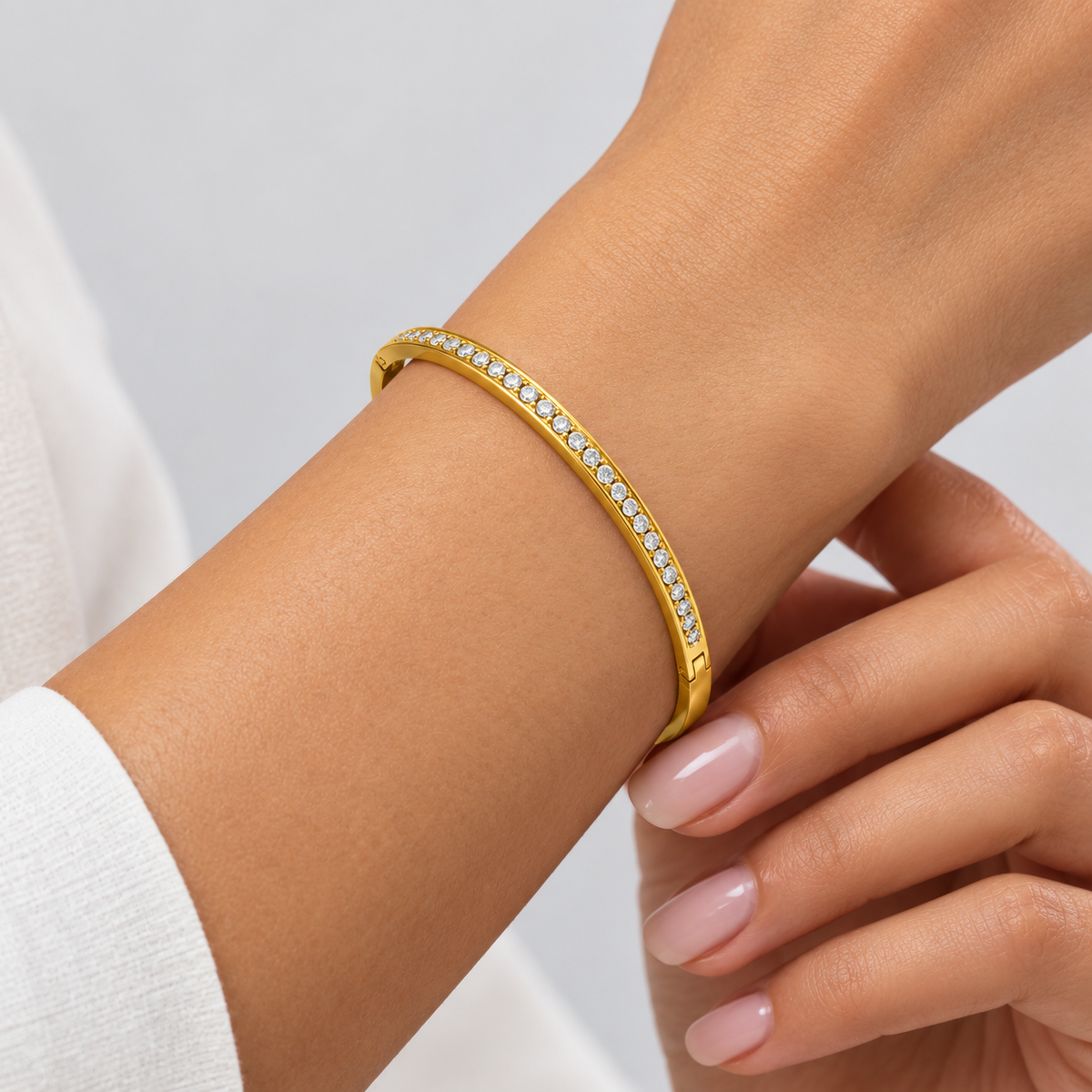 Lumière Slim Pavé Bangle worn by a studio model