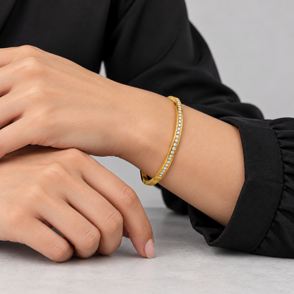 Lumière Slim Pavé Bangle worn by a studio model