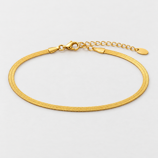 Serena Flat Snake Chain Bracelet on light gray background